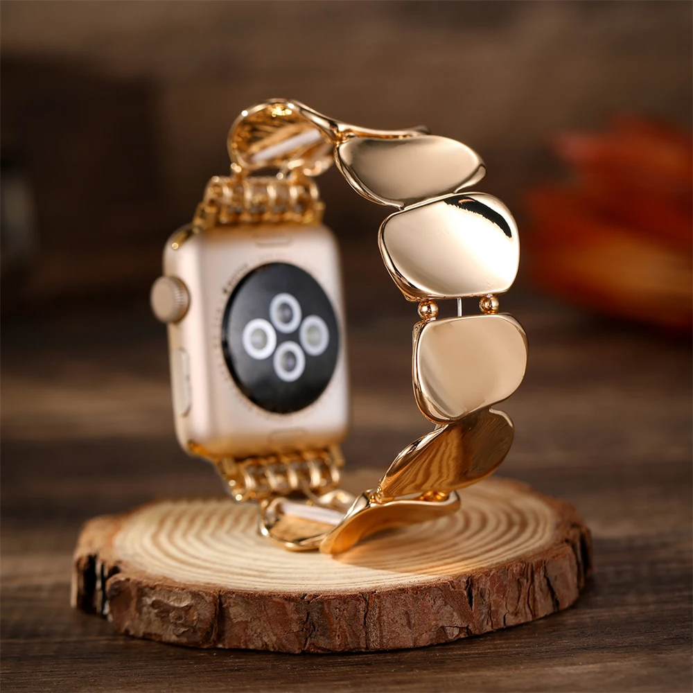 Elegant women's gold metal smartwatch band with stretch fit, a stylish watch accessory.