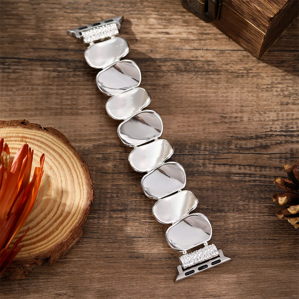 Elegant women's metal smartwatch band in silver, a stylish watch accessory.