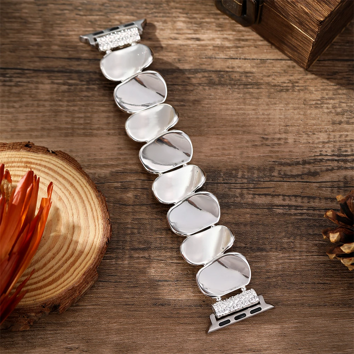 Elegant women's metal smartwatch band in silver, a stylish watch accessory.