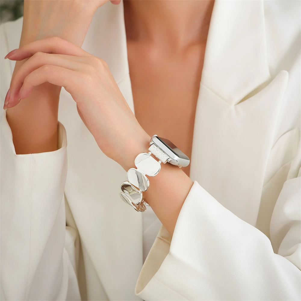 Elegant women's gold metal smartwatch band, sculpted jewelry design with stretch fit.