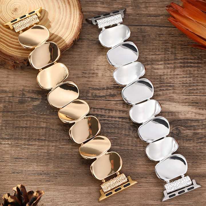 Sculpted gold metal smartwatch band, elegant and perfect for women's watch accessory.