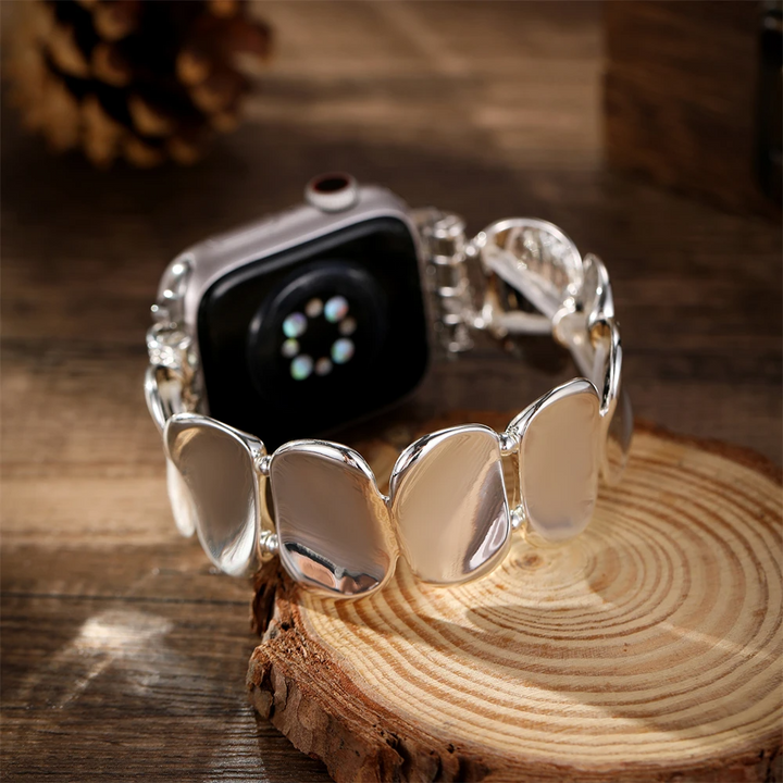 Women's elegant silver metal smartwatch band.