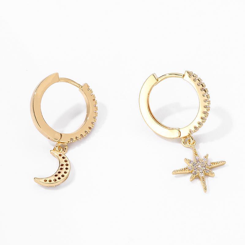 Women's elegant gold moon & star drop earrings with zirconia, adding a celestial touch to any outfit.