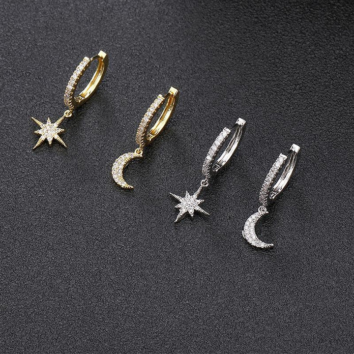 Shimmering silver celestial moon & star drop earrings for women, adorned with brilliant zirconia.