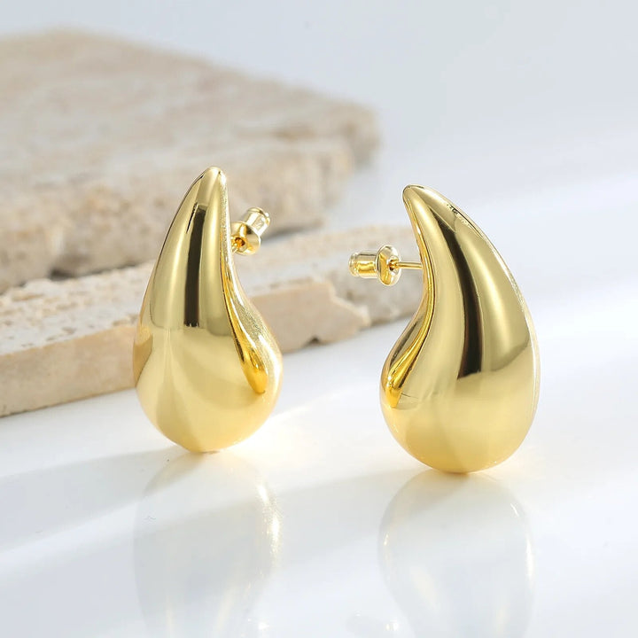Sparkling women's gold plated crystal drop earrings, an elegant addition to any jewelry collection.
