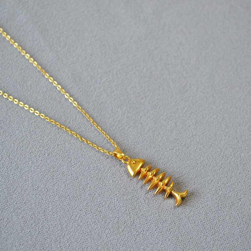 Delicate gold plated herringbone chain necklace for women, a timeless and versatile fashion accessory.