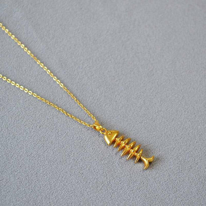 Delicate gold plated herringbone chain necklace for women, a timeless and versatile fashion accessory.