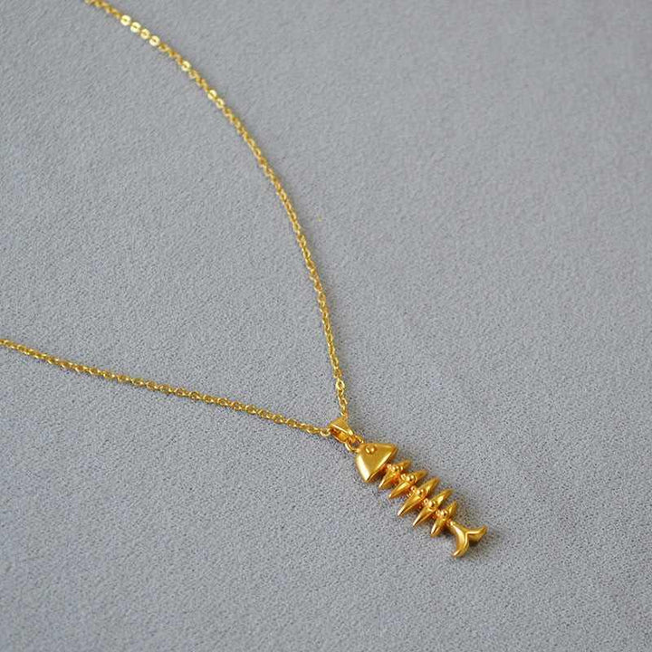 Smooth, flat gold plated herringbone chain necklace. Stylish women's jewelry for a chic, modern look.