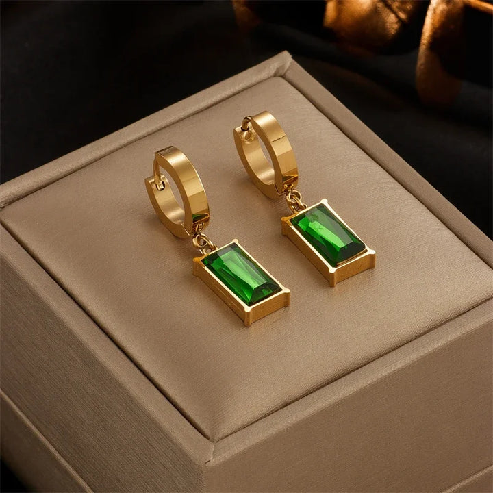 Giftable women's gold plated jewelry set, featuring an emerald green stone necklace and matching earrings.