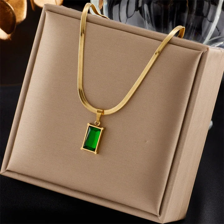Women's fashion accessory: elegant gold plated emerald green stone jewelry set, ideal for daily wear.