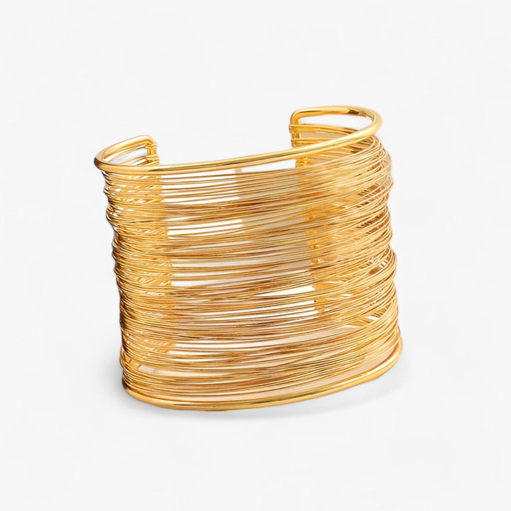Elegant women's gold plated layered wire cuff bracelet, a fashion statement piece.