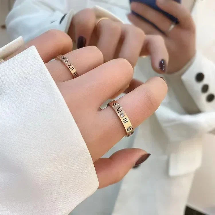 Trendy rose gold Roman numeral ring, perfect women's jewelry gift or fashion accessory.
