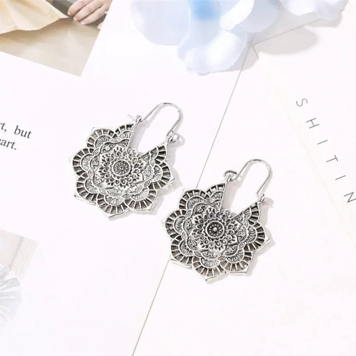 Elegant women's gold & silver lotus mandala earrings. Hypoallergenic spiritual jewelry, perfect for boho chic style.