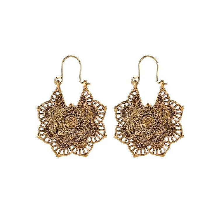 Beautiful gold & silver lotus mandala earrings for women. Hypoallergenic spiritual jewelry with a stylish boho chic design.
