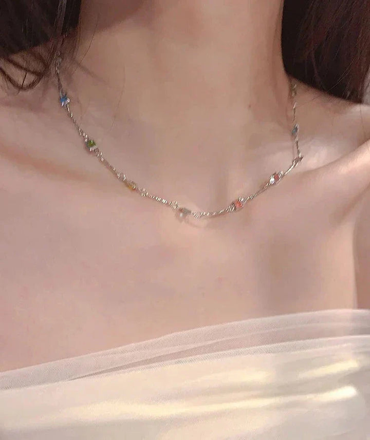 Beautiful gold & silver women's jewelry necklace featuring colorful stones. Elegant and versatile accessory for her.