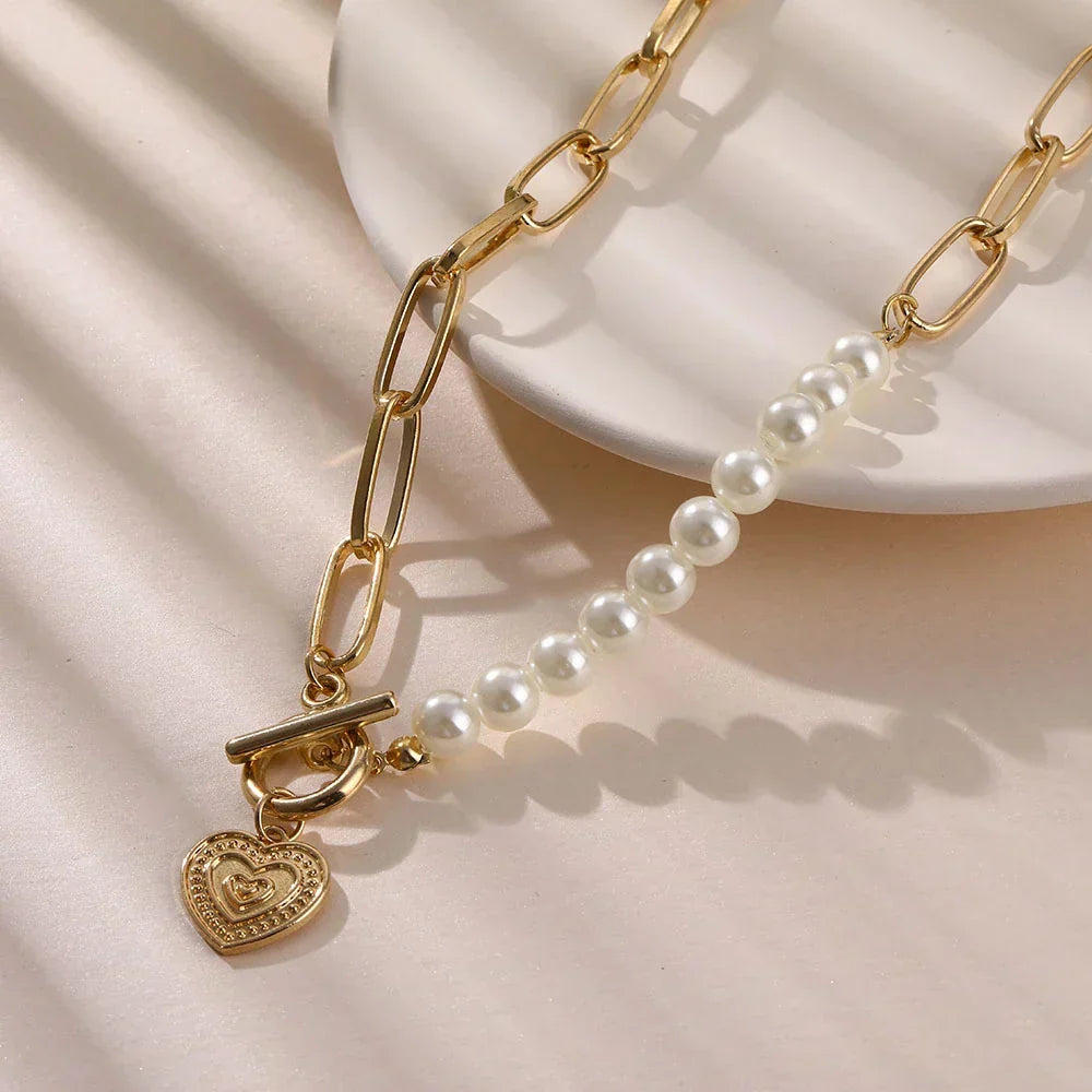 Adjustable gold heart necklace with elegant pearl accents, a beautiful love jewelry gift for women.