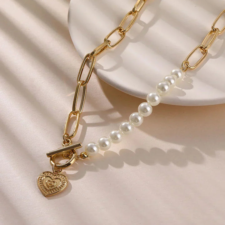 Adjustable gold heart necklace with elegant pearl accents, a beautiful love jewelry gift for women.