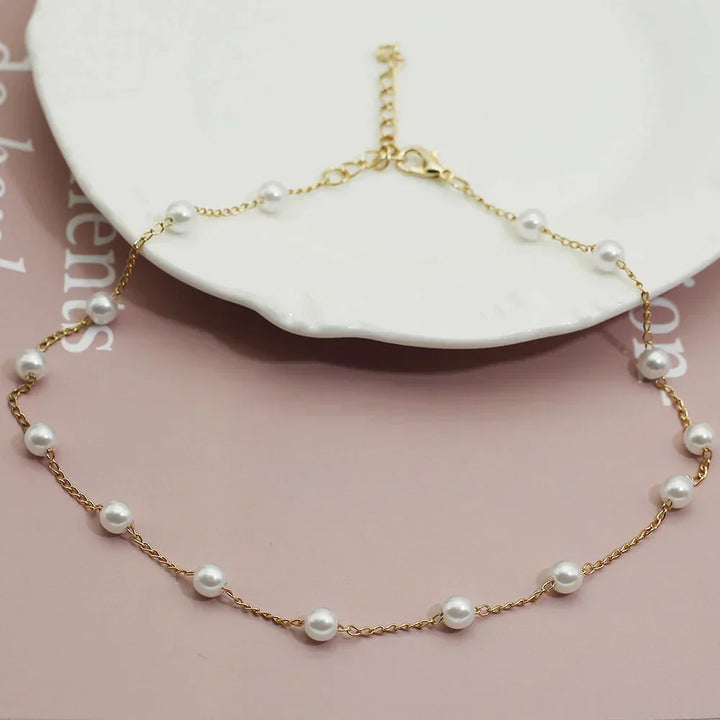 Classic golden pearl necklace for women, a timeless and elegant accessory perfect for any occasion.