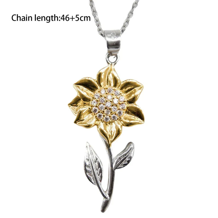 Delicate golden sunflower necklace for women. Stylish floral pendant, adjustable chain, a perfect addition to any jewelry collection.