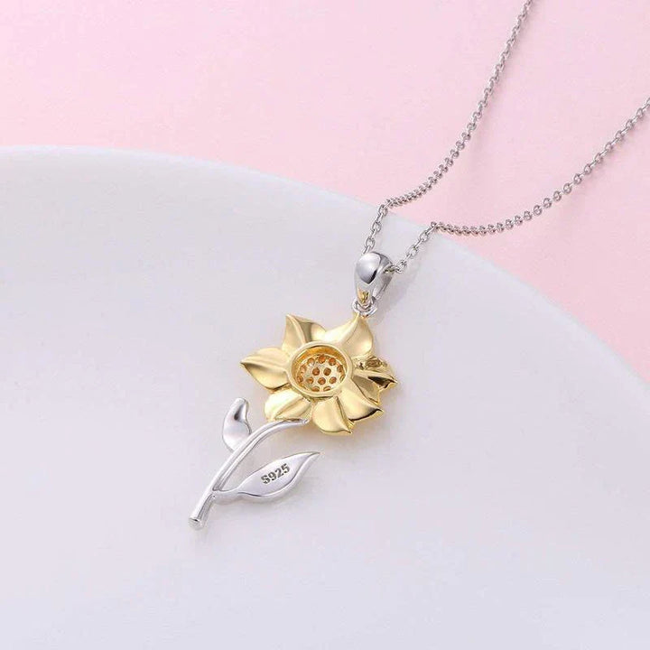 Bright golden sunflower necklace, a captivating floral pendant. Womens fashion jewelry, adjustable for a perfect fit.