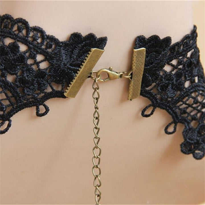 Unique Gothic style necklace for women. Features intricate charms, perfect for a bold fashion statement or elegant gift.