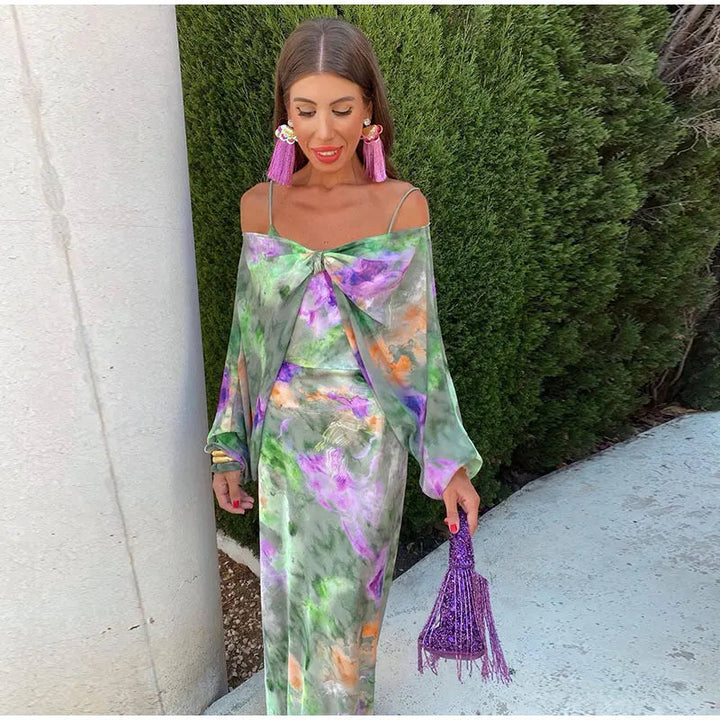 Elegant women's green corset maxi dress with an open back and detachable scarf, perfect for formal evening occasions.