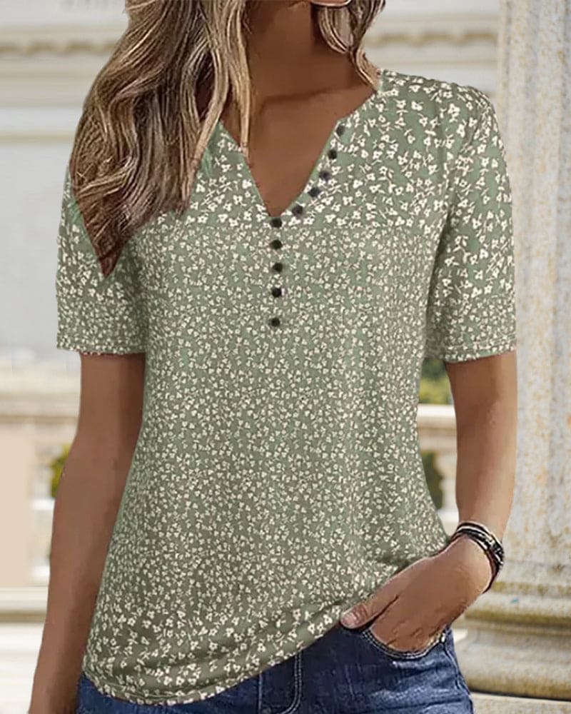 Vibrant green floral summer blouse for women, a comfortable and chic top perfect for elegant or casual wear.