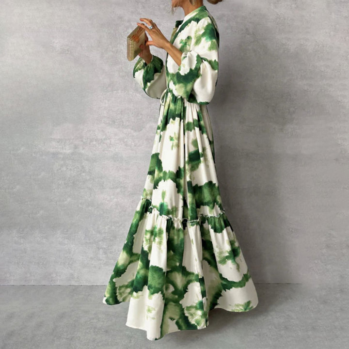 Elegant women's green maxi dress with long sleeves & a stylish pointed neckline. Perfect for parties & formal wear.