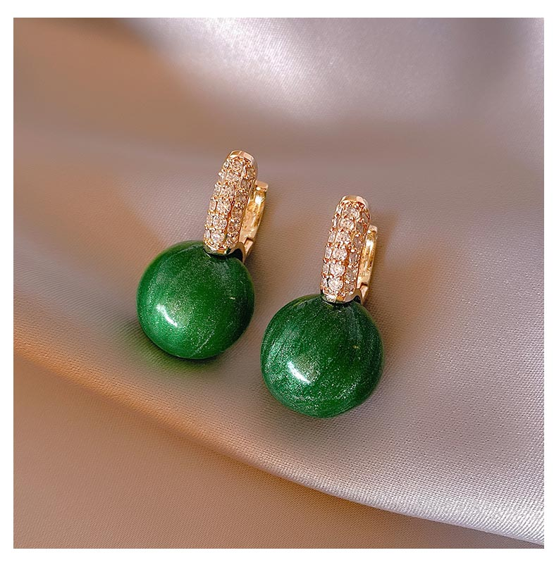 Elegant women's green pearl drop earrings with gold plating, perfect for formal occasions or a luxury gift.