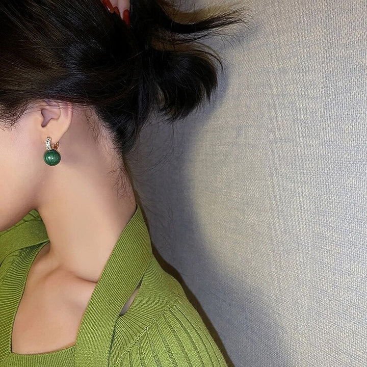 Formal green pearl drop earrings with gold accents, perfect elegant jewelry for women's special events.