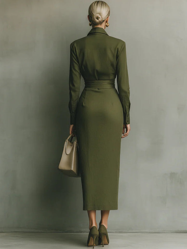 Fashionable women's green midi wrap dress, offering a flattering style for both professional and evening looks.