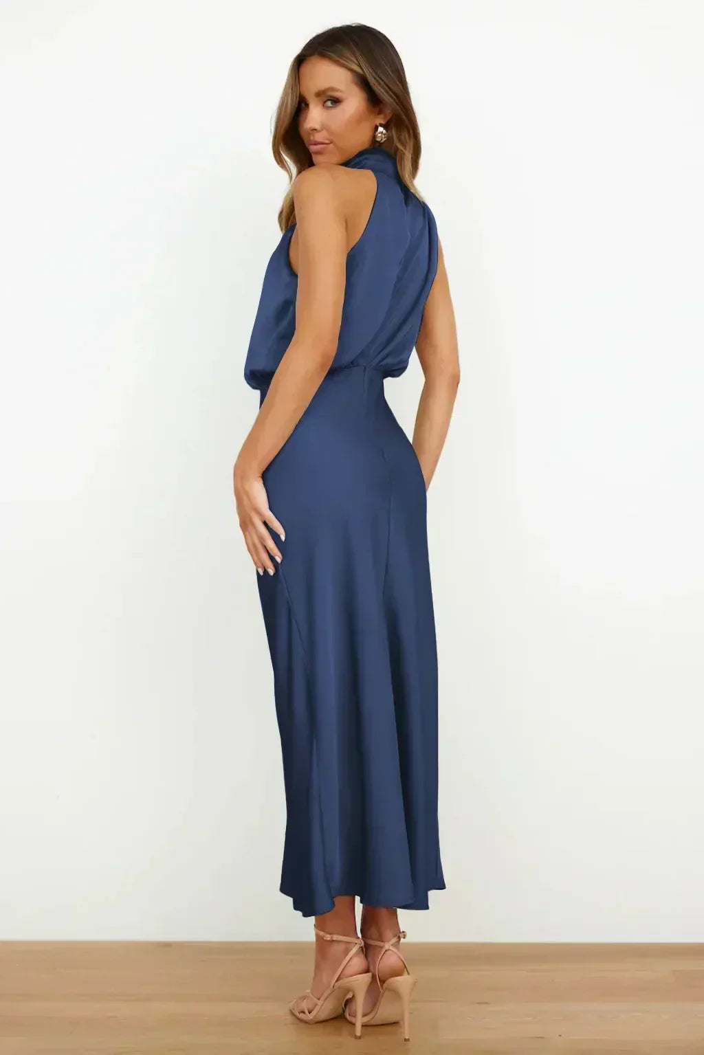 Women's elegant open back formal dress. Halter style, floor-length, great for any special evening occasion.