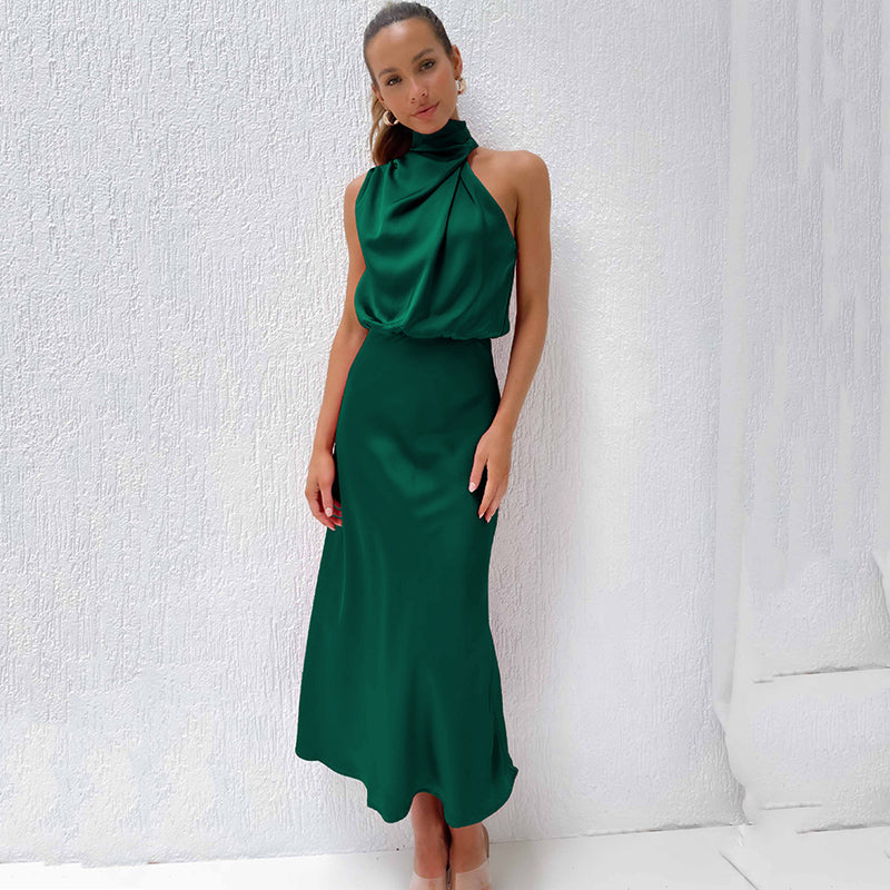 Stylish halter evening gown for women. Floor-length, open back, perfect for formal wear or special events.