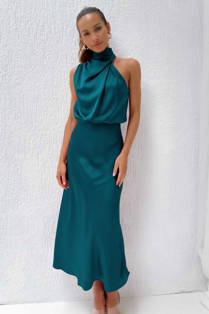 Prom-perfect halter evening gown. Floor-length dress with an open back for women's formal occasions.