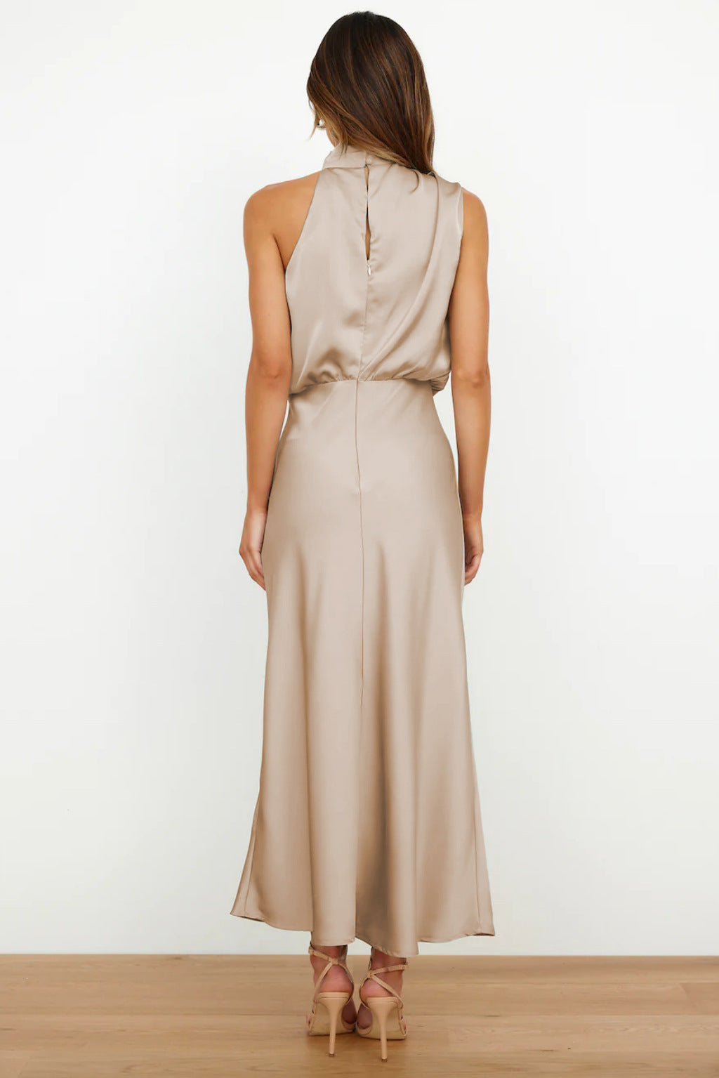 Sophisticated long halter dress. Elegant open back evening gown, perfect for a wedding guest or prom.