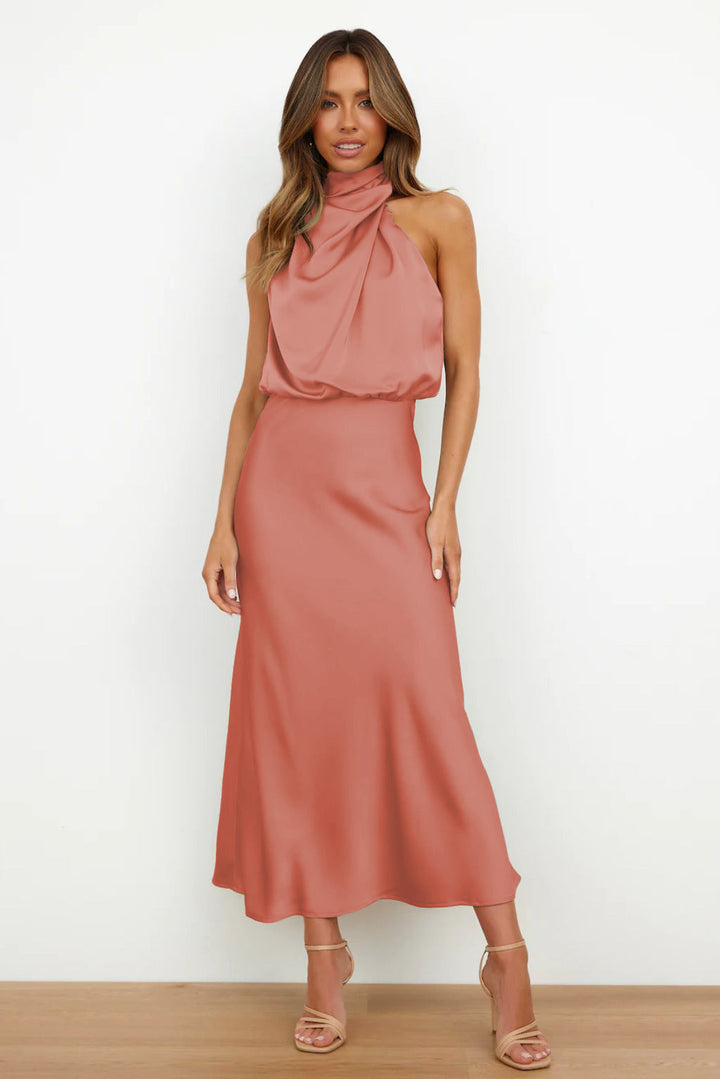 Beautiful women's formal gown. Halter neck, floor-length, and an alluring open back for special events.