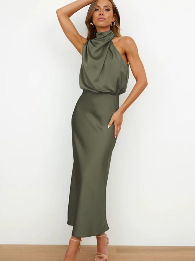 Formal women's halter gown. Elegant floor-length dress with an open back, ideal for evening events.