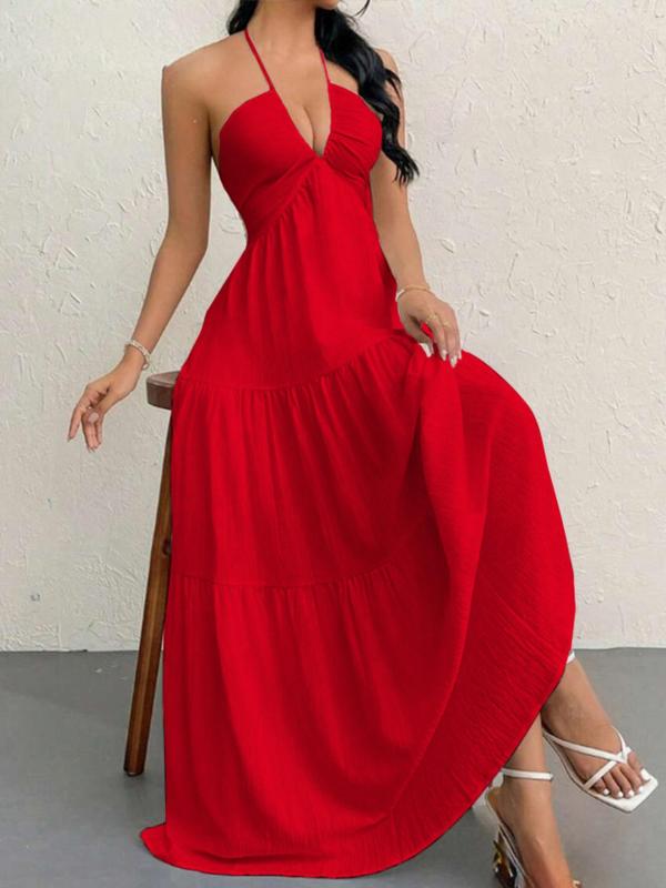 Comfortable women's halter maxi dress with a graceful flowing tiered skirt. Ideal elegant summer dress.