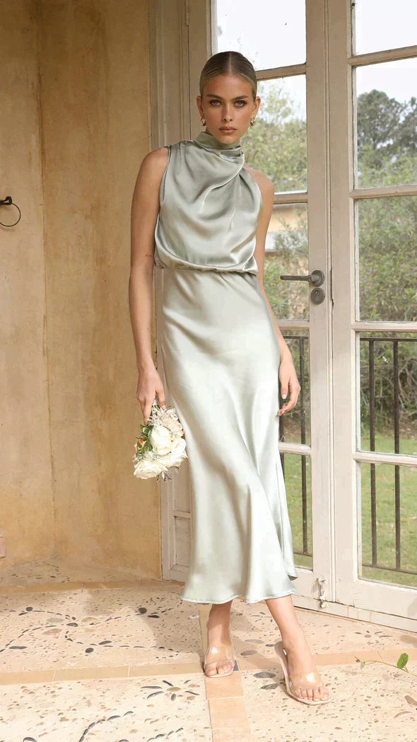 Chic women's halter midi dress, suitable for cocktail parties and formal occasions.