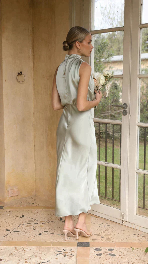 Stylish women's midi halter dress, elegant fashion for any special evening event.
