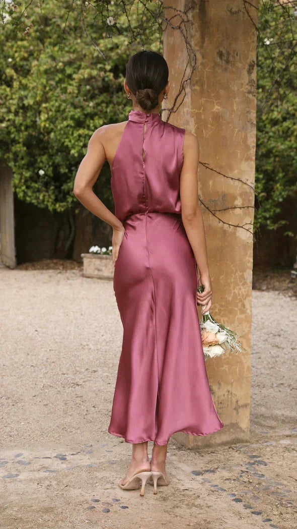 Comfortable & elegant women's halter midi dress, flowy design for summer fashion.