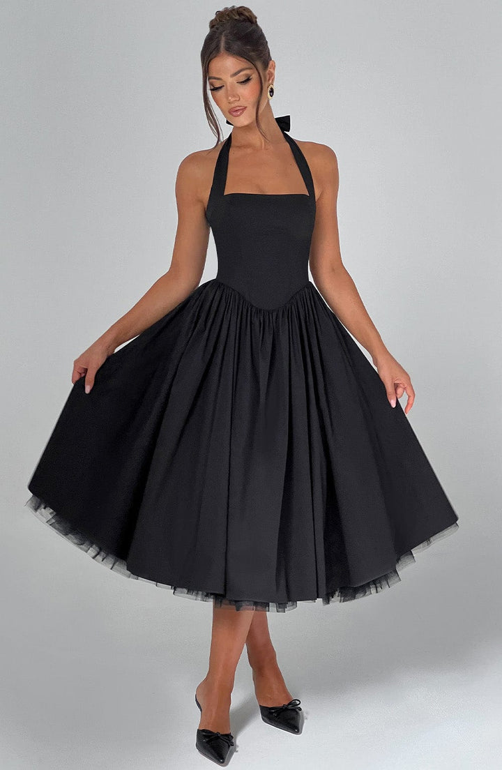 Vintage-inspired halter neck midi cocktail dress for women, offering an elegant event style.
