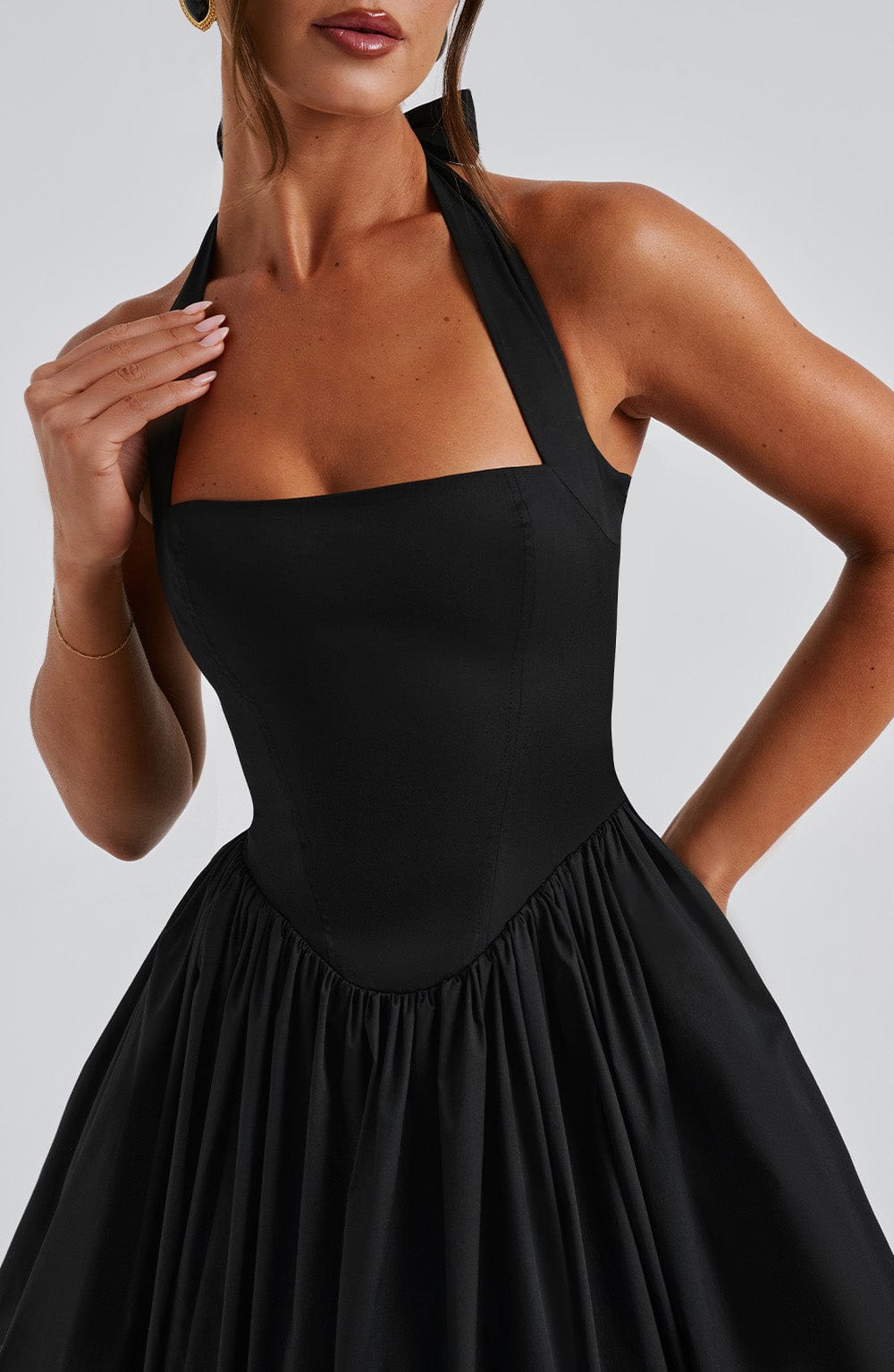 Women's special occasion halter neck midi dress, a sophisticated and elegant formal option.