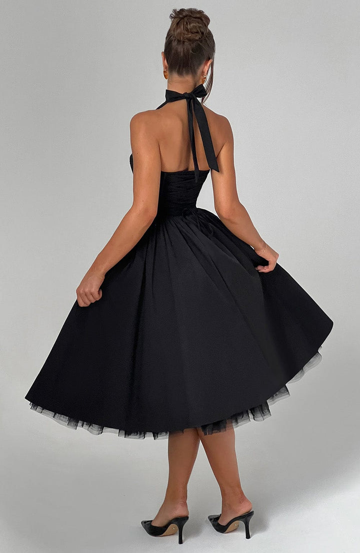 Stylish A-line halter neck midi dress for women, perfect as a cocktail or wedding guest dress.