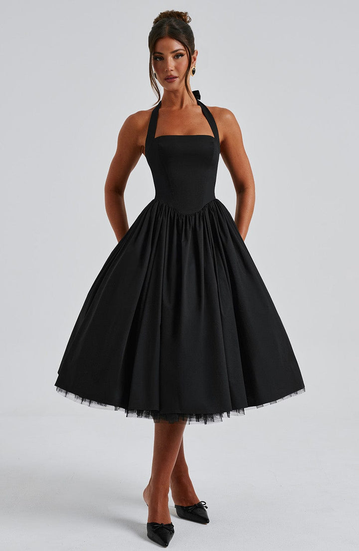 Sophisticated women's halter neck midi dress, perfect for a chic formal or party look.