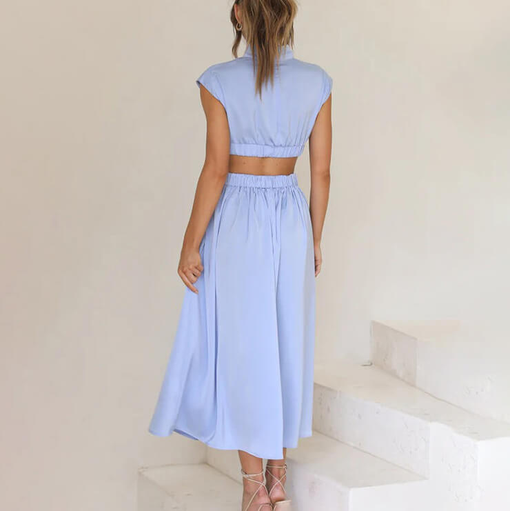 Must-have women's party dress; a versatile midi with a modern halter neckline & alluring side slit.