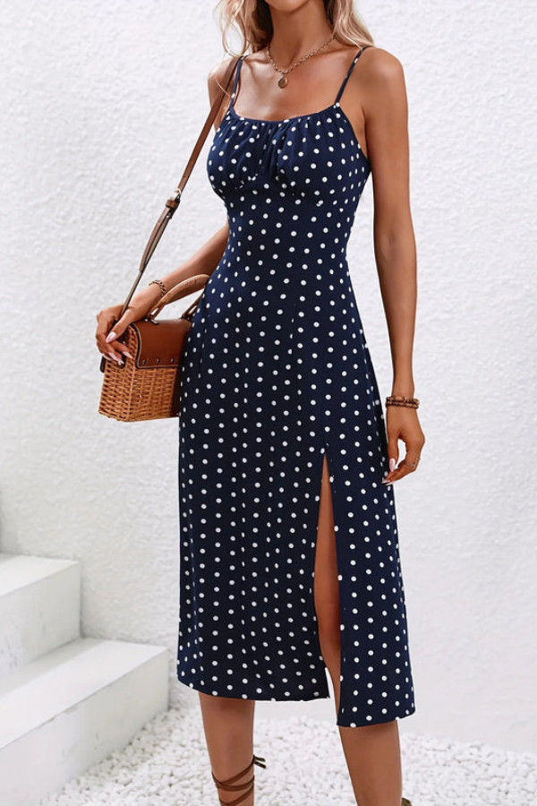 Sleeveless pleated halter neck midi dress for women, offering an elegant look for casual or formal summer events.