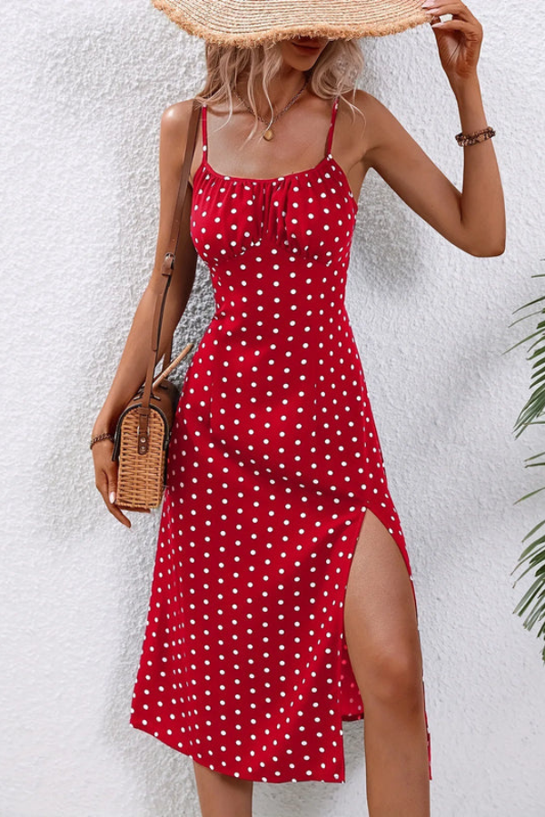 Front view of a women's elegant pleated halter neck midi dress, showcasing its flattering A-line silhouette for spring.