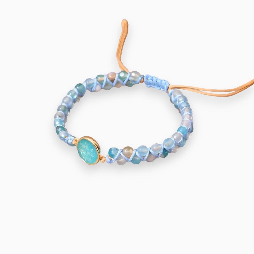 Elegant women's handmade bracelet with dream opal and blue quartz gemstones, a beautiful statement accessory.