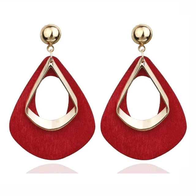 Elegant women's handmade wooden teardrop earrings, natural charm, lightweight & unique statement jewelry.